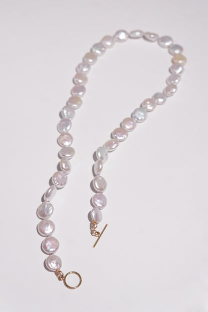 White Coin Pearls Knotted Necklace toddle white background